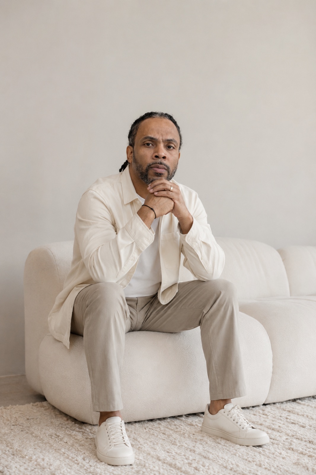Pastor David Lynn seated in a quiet, light-filled space